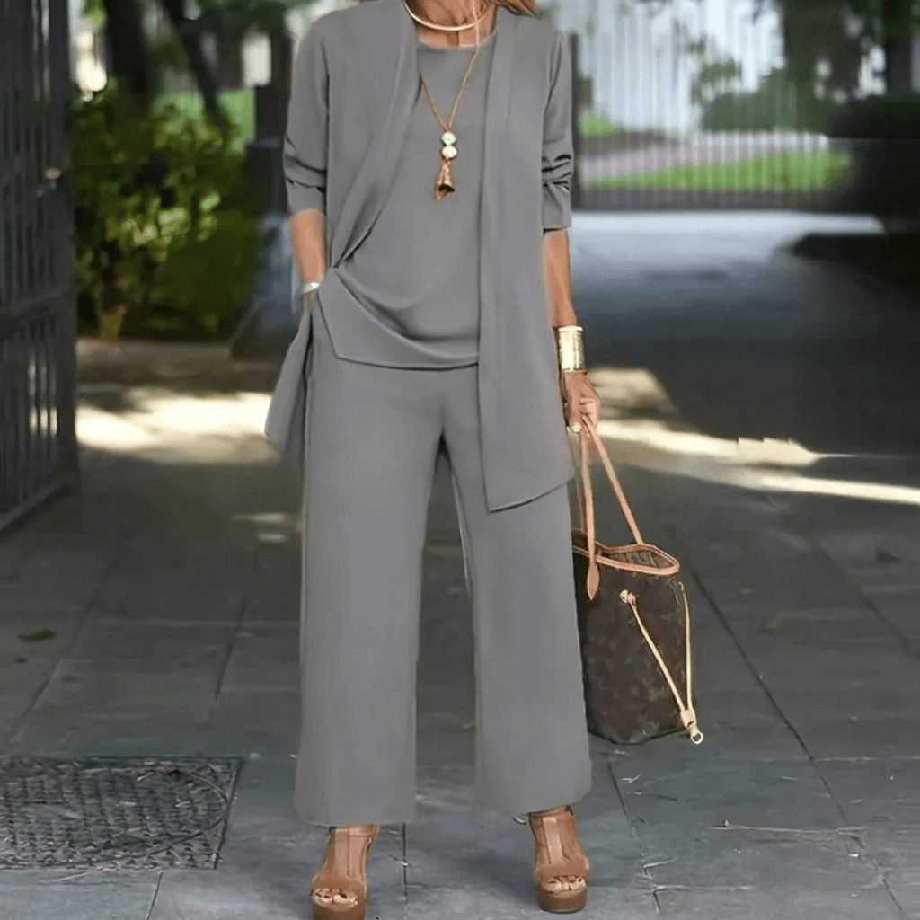 Women's loungewear set featuring wide leg pants and a stylish cardigan jacket, perfect for everyday comfort and chic layering. 0