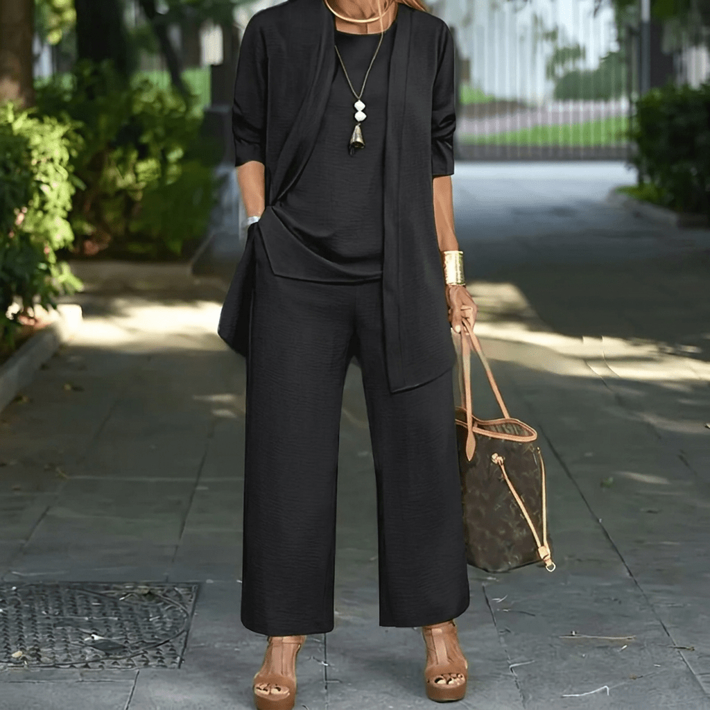 Women's loungewear set featuring wide leg pants and a stylish cardigan jacket, perfect for everyday comfort and chic layering. 1