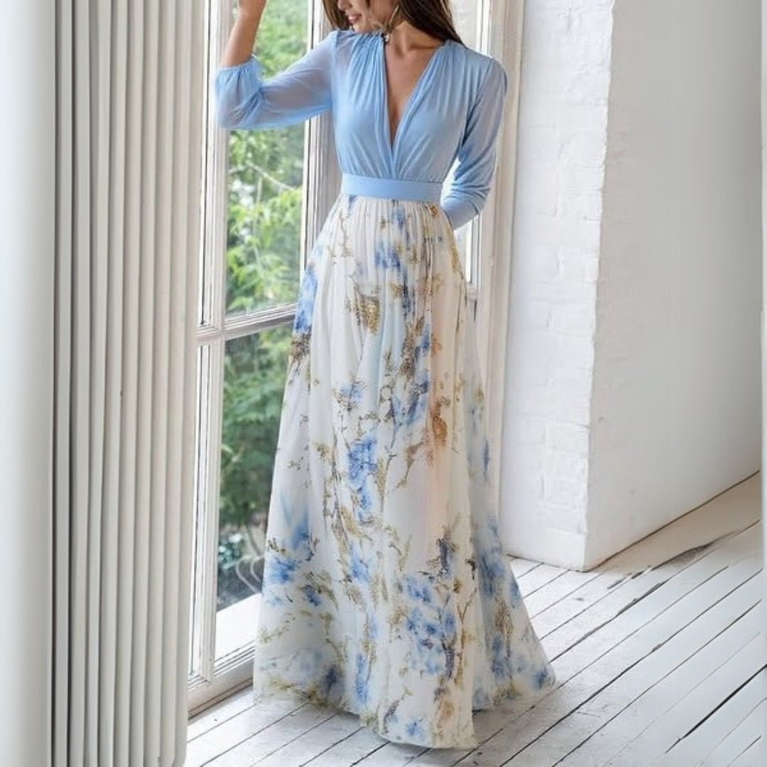 Women's maxi dress featuring an elegant V-neck design, floral motifs, and flowing sleeves, ideal for summer outings and formal occasions. 1