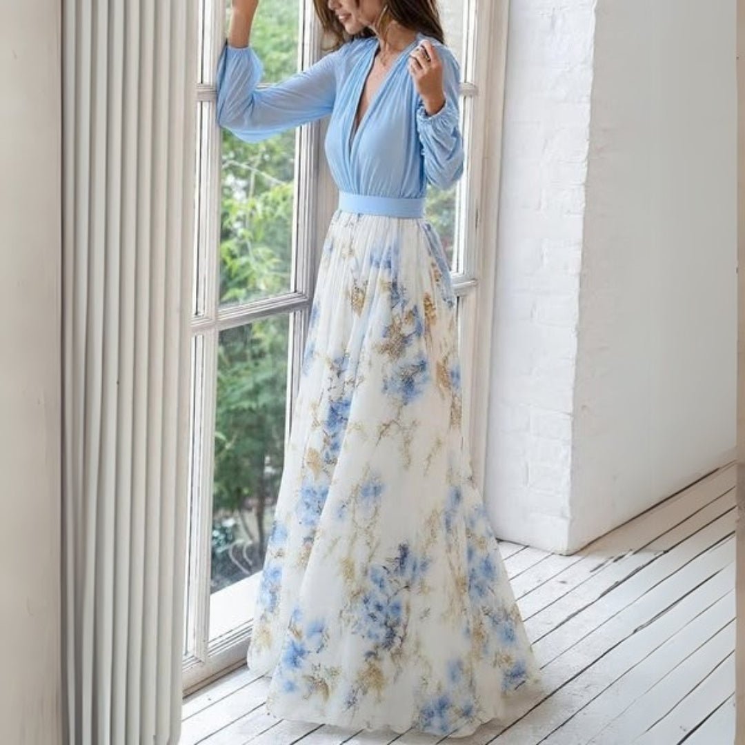 Women's maxi dress featuring an elegant V-neck design, floral motifs, and flowing sleeves, ideal for summer outings and formal occasions. 2