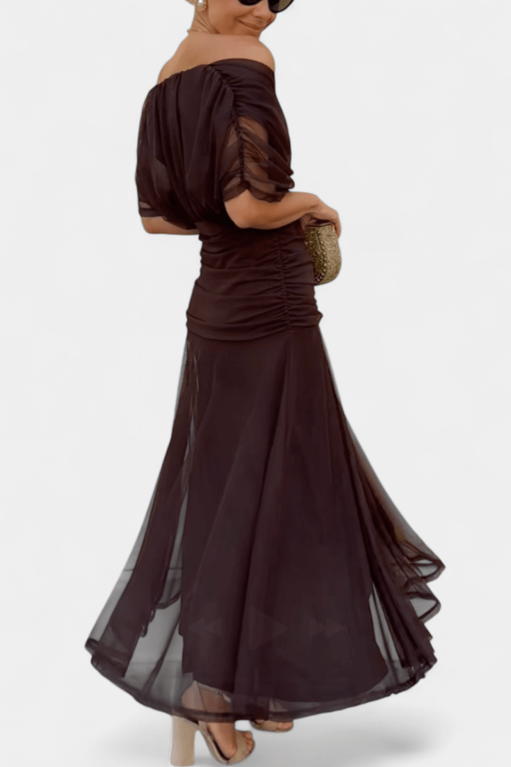 Elegant women's maxi dress featuring a flattering V-neck and flowing sleeves, perfect for both casual outings and formal events. 1