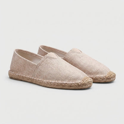 Women's orthopedic slip-on espadrilles featuring a stylish jute sole, designed for comfort and support during summer outings. 2
