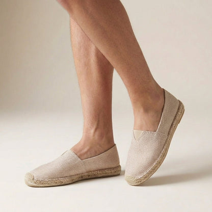 Women's orthopedic slip-on espadrilles featuring a stylish jute sole, designed for comfort and support during summer outings. 1