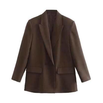 Women's oversized blazer in black and white, featuring a contemporary chic style perfect for versatile wear in any occasion. 3