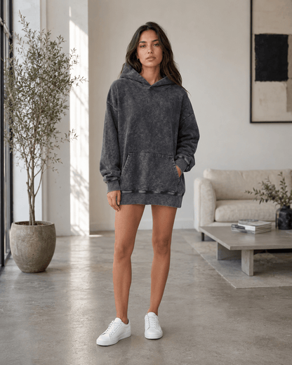 Women's oversized hoodie in washed black featuring a kangaroo pocket, perfect for casual wear and layering in any season. 0
