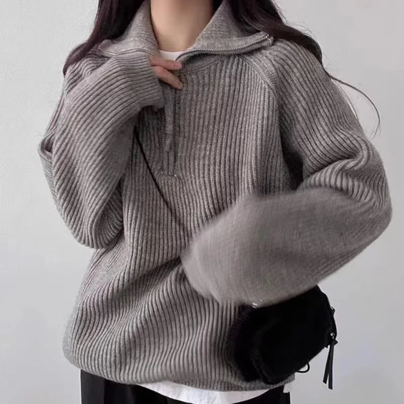 Women's oversized jumper featuring a quarter-zip neckline and ribbed knit texture, perfect for casual autumn and winter wear. 3