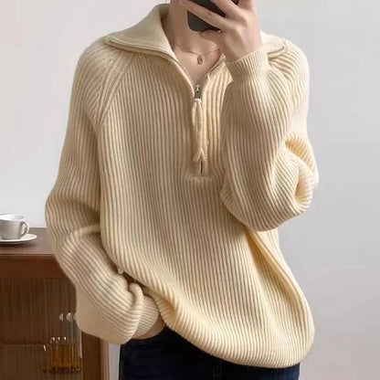 Women's oversized jumper featuring a quarter-zip neckline and ribbed knit texture, perfect for casual autumn and winter wear. 5