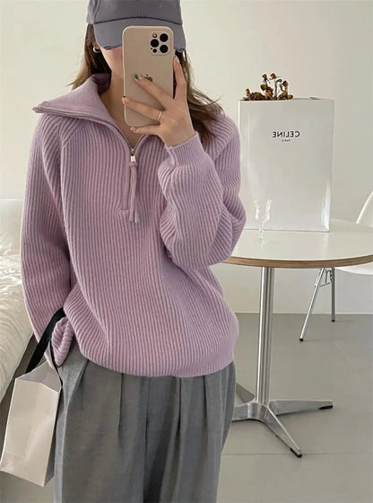 Women's oversized jumper featuring a quarter-zip neckline and ribbed knit texture, perfect for casual autumn and winter wear. 0