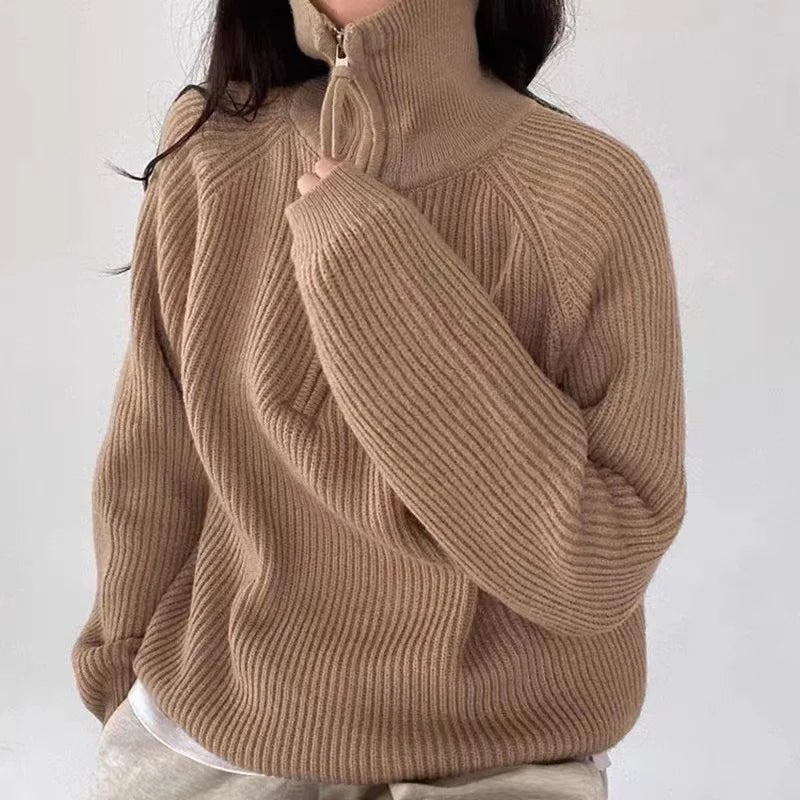 Women's oversized jumper featuring a quarter-zip neckline and ribbed knit texture, perfect for casual autumn and winter wear. 4