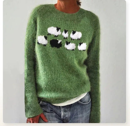 Women's oversized sweater featuring a wide boat neckline, cozy retro striped design, and soft knit fabric, perfect for casual and comfortable style. 5