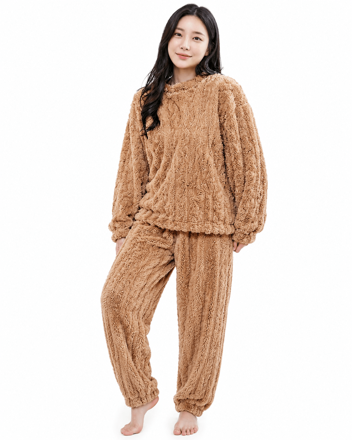 Women's winter pajama set featuring a cozy long sleeve top and matching bottoms made from plush fabric, perfect for warm and comfortable nights. 0
