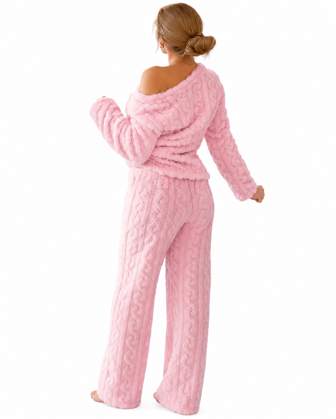 Women's winter pajama set featuring a cozy long sleeve top and matching bottoms made from plush fabric, perfect for warm and comfortable nights. 1