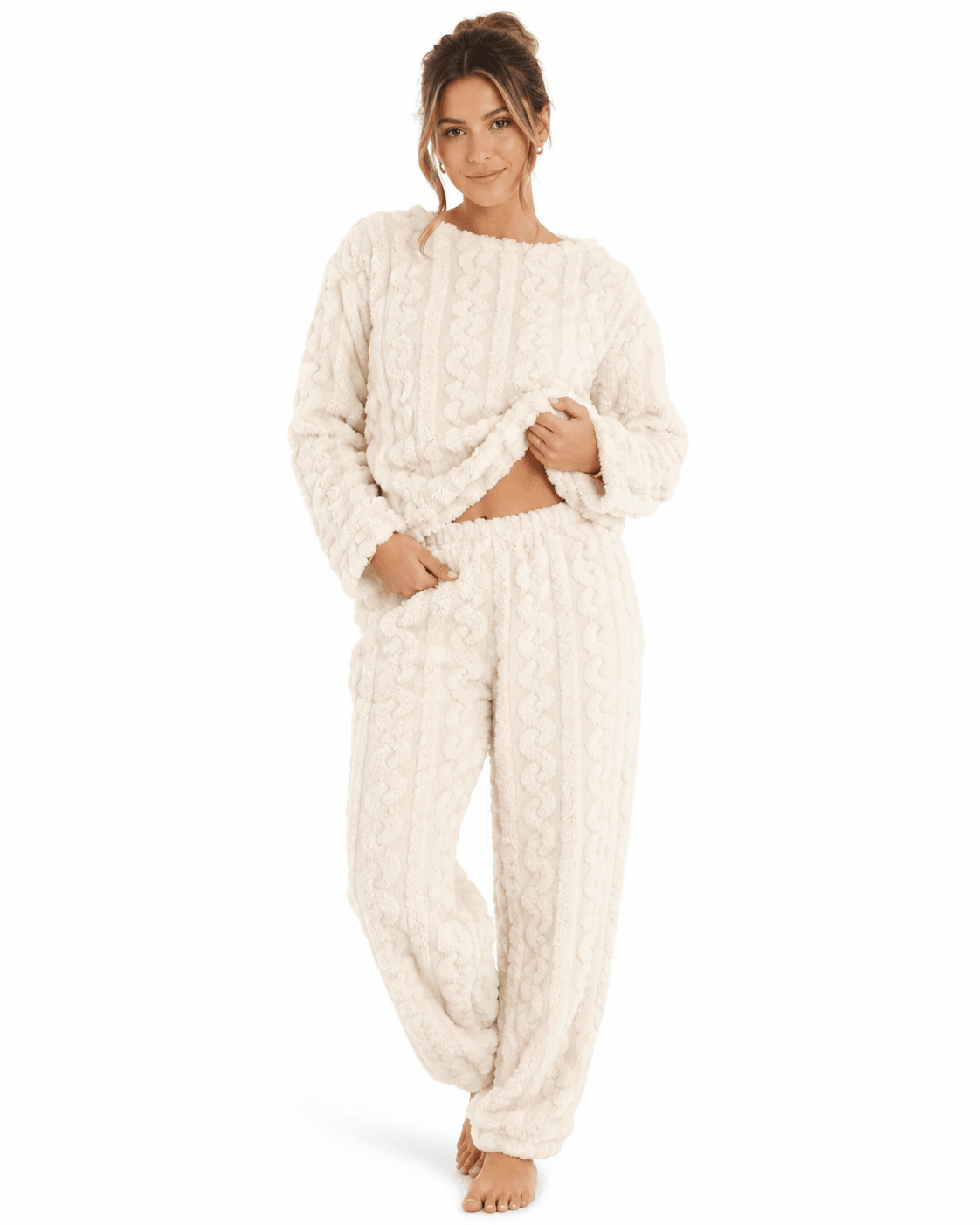 Women's winter pajama set featuring a cozy long sleeve top and matching bottoms made from plush fabric, perfect for warm and comfortable nights. 3