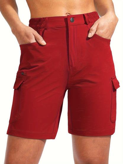 Women's quick-dry cargo shorts designed for hiking, featuring lightweight stretch fabric and seven functional pockets for convenience and comfort in outdoor activities. 1
