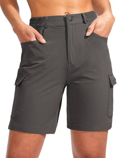 Women's quick-dry cargo shorts designed for hiking, featuring lightweight stretch fabric and seven functional pockets for convenience and comfort in outdoor activities. 0