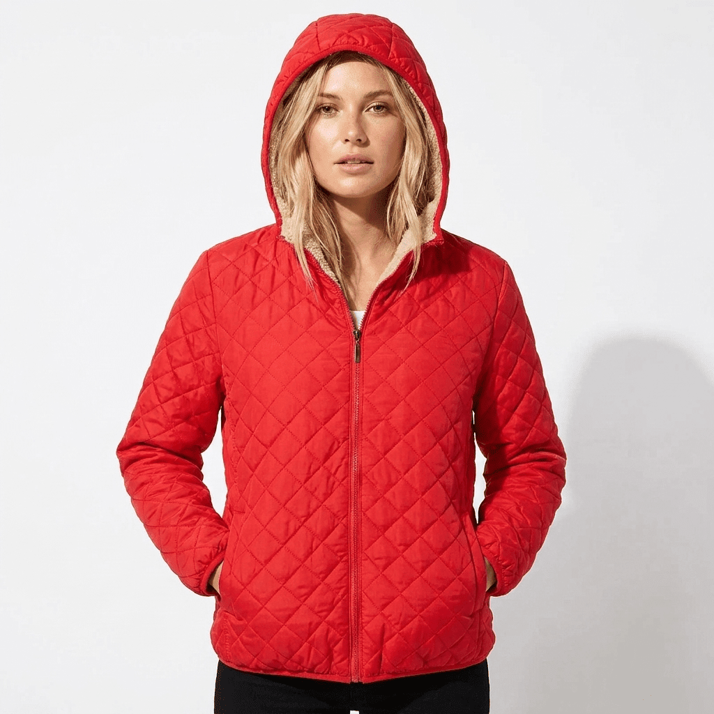 Women's quilted jacket featuring a fleece-lined hood and zip-up closure, designed for warmth and style, perfect for winter wear. 6