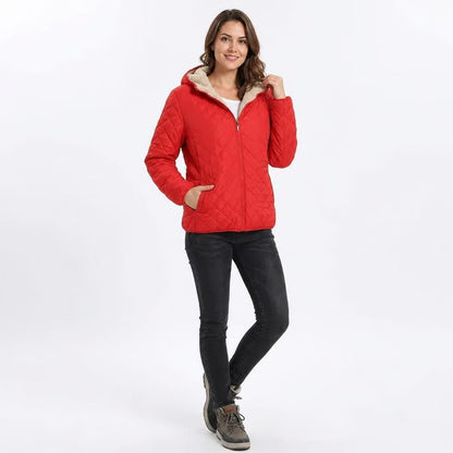 Women's quilted jacket featuring a fleece-lined hood and zip-up closure, designed for warmth and style, perfect for winter wear. 7