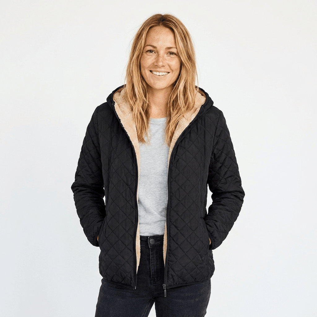 Women's quilted jacket featuring a fleece-lined hood and zip-up closure, designed for warmth and style, perfect for winter wear. 0