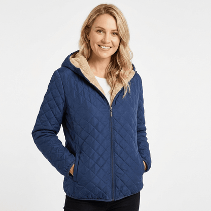 Women's quilted jacket featuring a fleece-lined hood and zip-up closure, designed for warmth and style, perfect for winter wear. 11