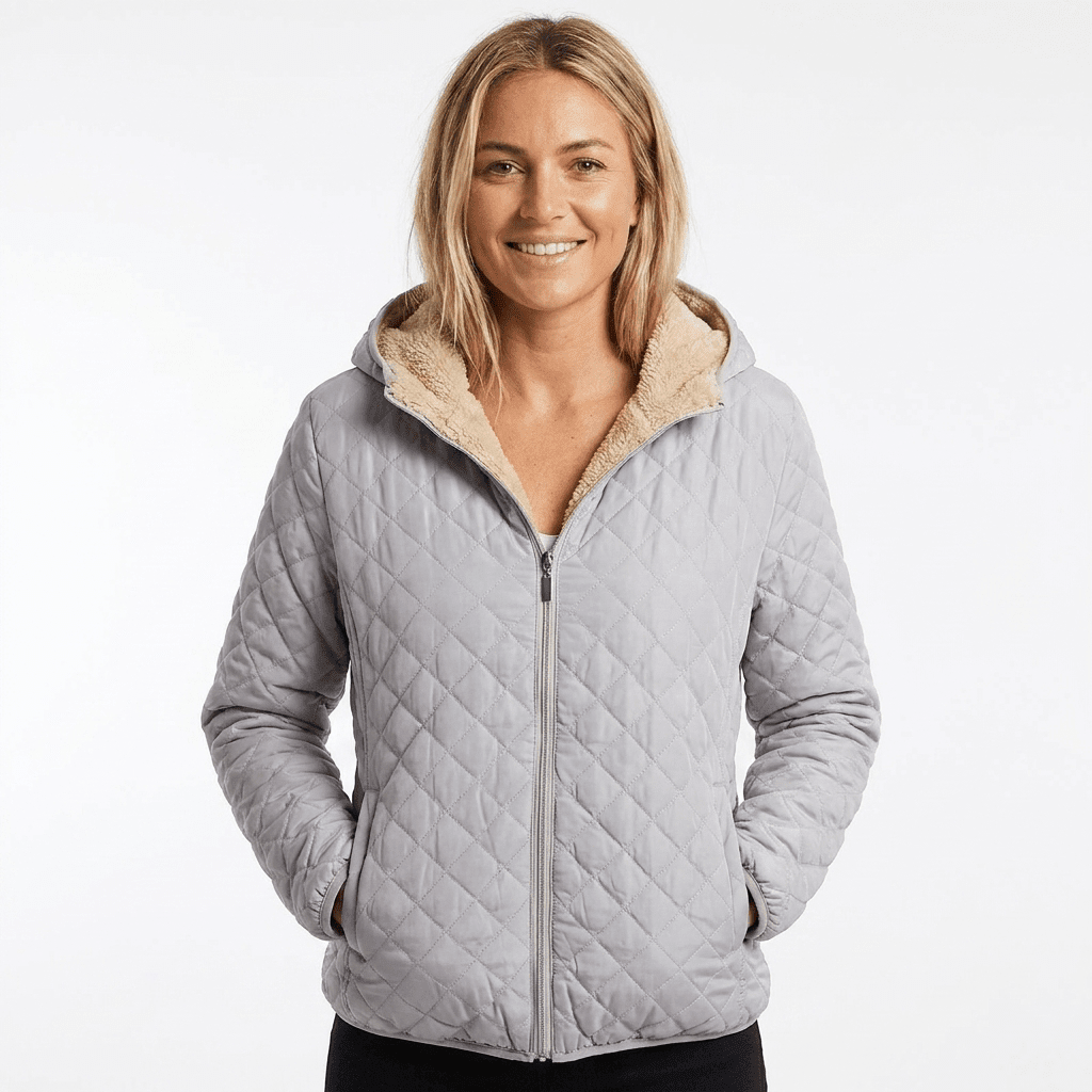 Women's quilted jacket featuring a fleece-lined hood and zip-up closure, designed for warmth and style, perfect for winter wear. 9