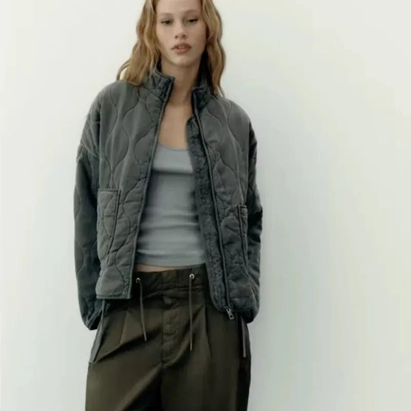 Women's vintage cotton quilted jacket featuring a high collar and practical pockets, perfect for winter warmth and style. 5