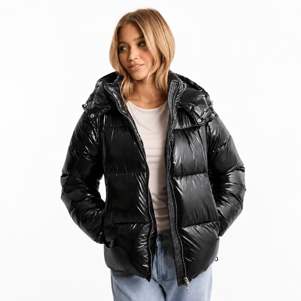 Women's quilted jacket featuring a removable hood, water-repellent fabric, and a modern design, perfect for stylish winter wear. 0