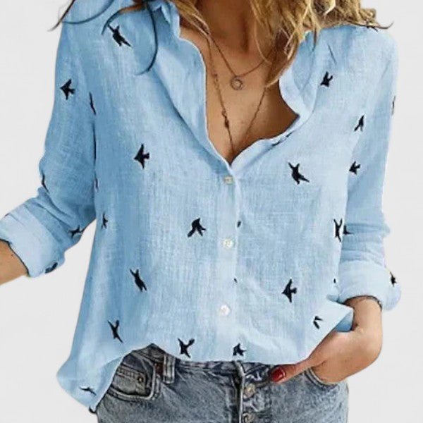 Women's relaxed fit button-down shirt featuring a classic collar, crafted from versatile soft fabric, available in multiple colors for effortless style and comfort. 7