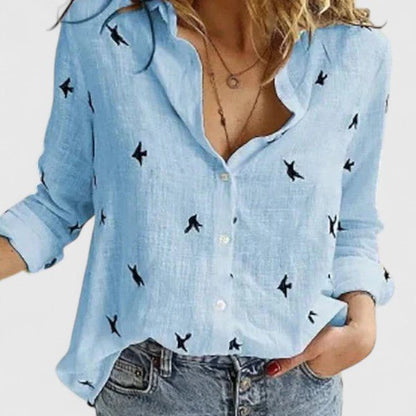 Women's relaxed fit button-down shirt featuring a classic collar, crafted from versatile soft fabric, available in multiple colors for effortless style and comfort. 7