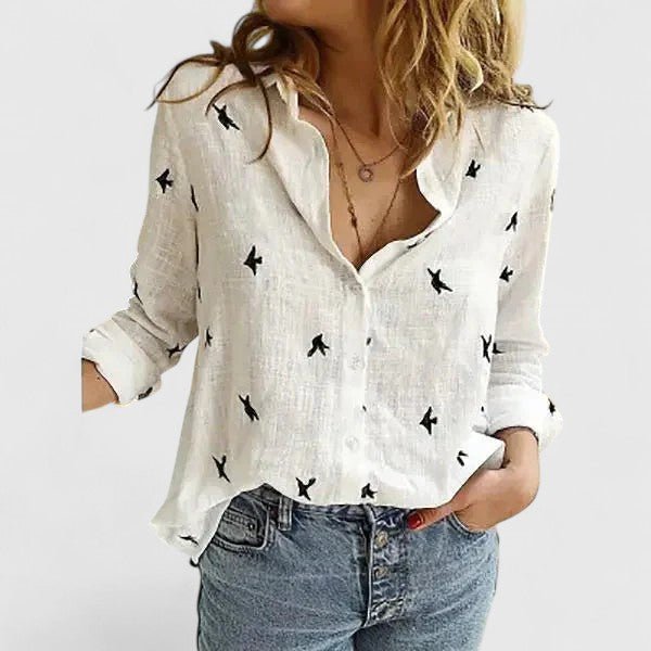 Women's relaxed fit button-down shirt featuring a classic collar, crafted from versatile soft fabric, available in multiple colors for effortless style and comfort. 6