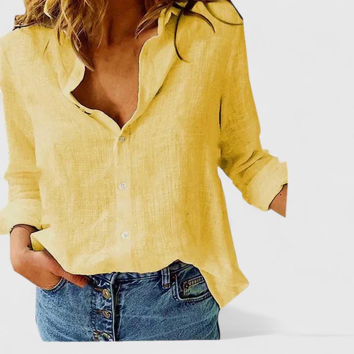 Women's relaxed fit button-down shirt featuring a classic collar, crafted from versatile soft fabric, available in multiple colors for effortless style and comfort. 10