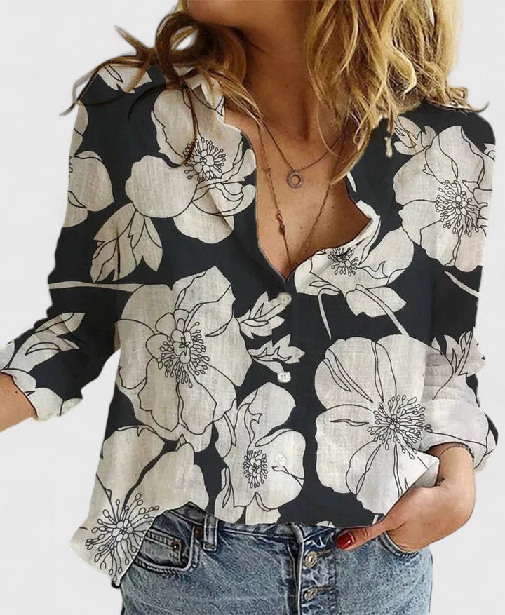 Women's relaxed fit button-down shirt featuring a classic collar, crafted from versatile soft fabric, available in multiple colors for effortless style and comfort. 1