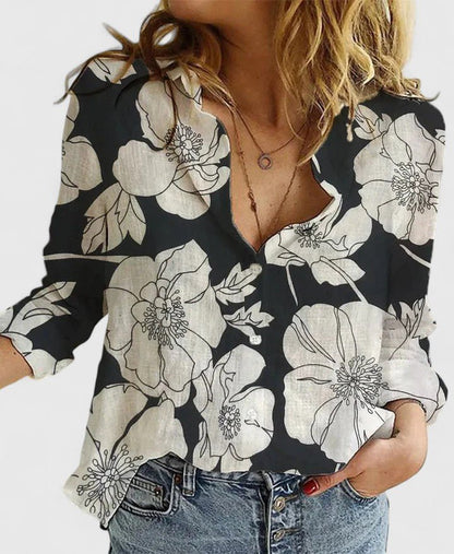 Women's relaxed fit button-down shirt featuring a classic collar, crafted from versatile soft fabric, available in multiple colors for effortless style and comfort. 1