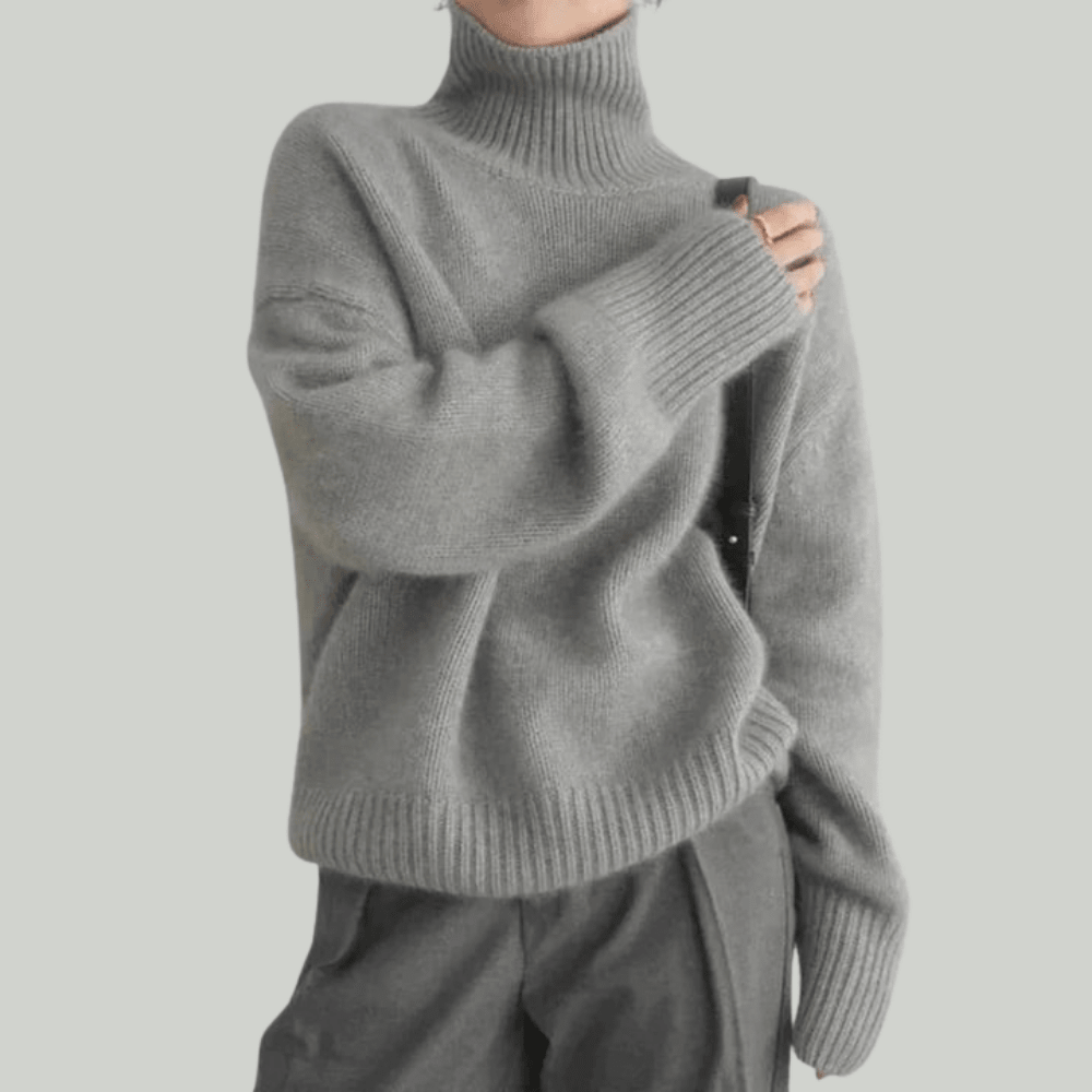 Women's ribbed knit turtleneck sweater, cozy pullover design available in multiple colors, perfect for stylish layering in colder weather. 3