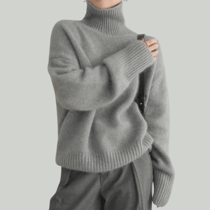 Women's ribbed knit turtleneck sweater, cozy pullover design available in multiple colors, perfect for stylish layering in colder weather. 3