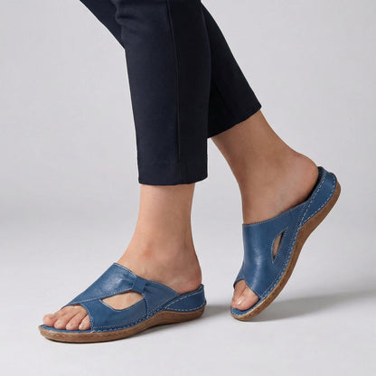 Women's leather open-toe slide sandals featuring arch support for all-day comfort, perfect for casual outings and summer wear. 1