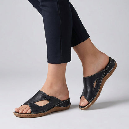 Women's leather open-toe slide sandals featuring arch support for all-day comfort, perfect for casual outings and summer wear. 0