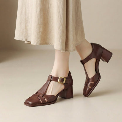 Women's sandals featuring a chunky heel and stylish T-strap design, perfect for comfortable summer footwear. 2