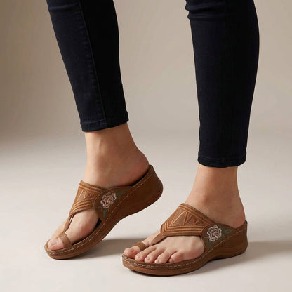 Women's sandals featuring floral embroidery, orthopedic wedge design for enhanced comfort, perfect for summer wear. 0