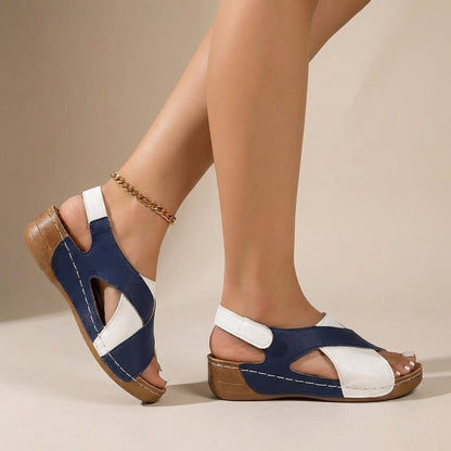 Women's orthopedic slingback sandals featuring a criss-cross design and comfortable wedge heel, perfect for summer outings. 2