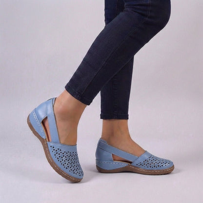 Women's sandals featuring a scalloped cut-out design, designed for summer comfort with breathable materials and orthopedic support, perfect for slip-on wear. 5