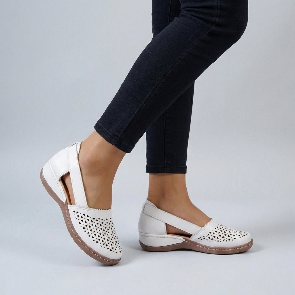 Women's sandals featuring a scalloped cut-out design, designed for summer comfort with breathable materials and orthopedic support, perfect for slip-on wear. 6