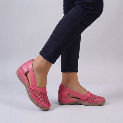 Women's sandals featuring a scalloped cut-out design, designed for summer comfort with breathable materials and orthopedic support, perfect for slip-on wear. 4