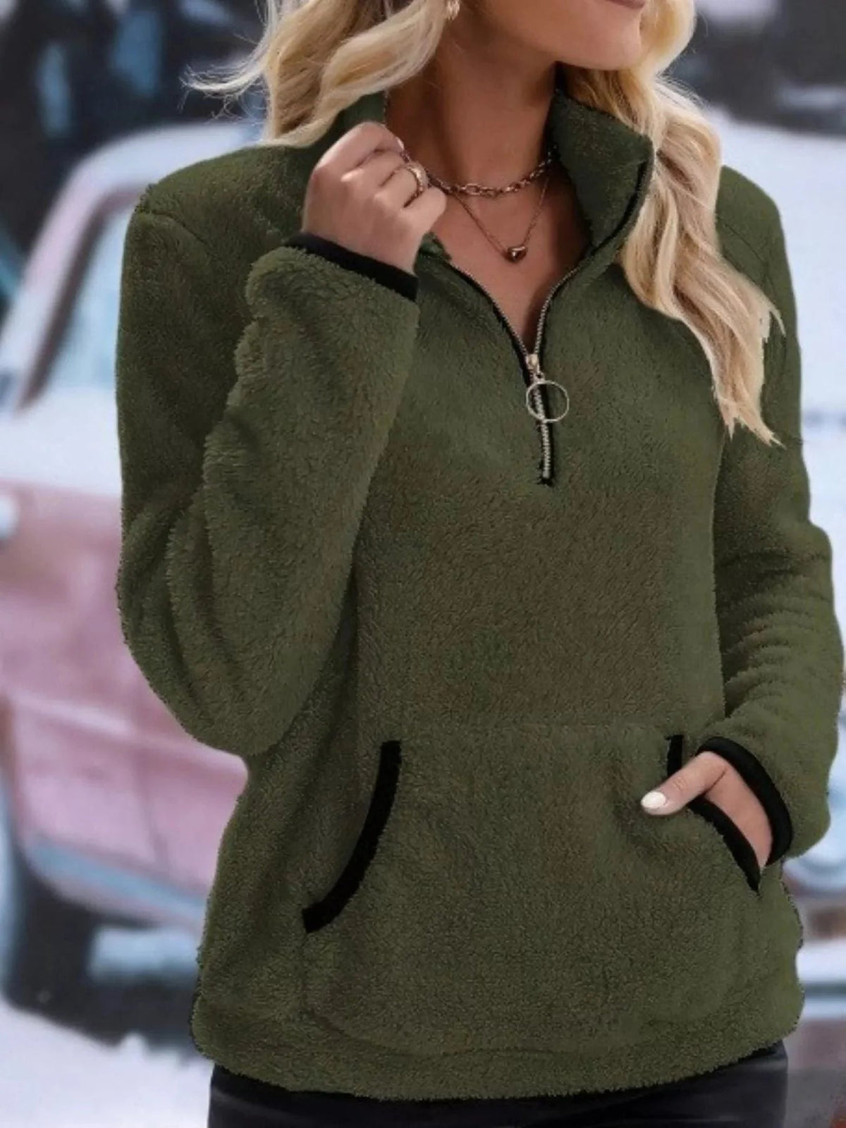 Women's Sherpa fleece pullover featuring a half-zip design and kangaroo pocket, perfect for a relaxed fit in autumn and winter. 10
