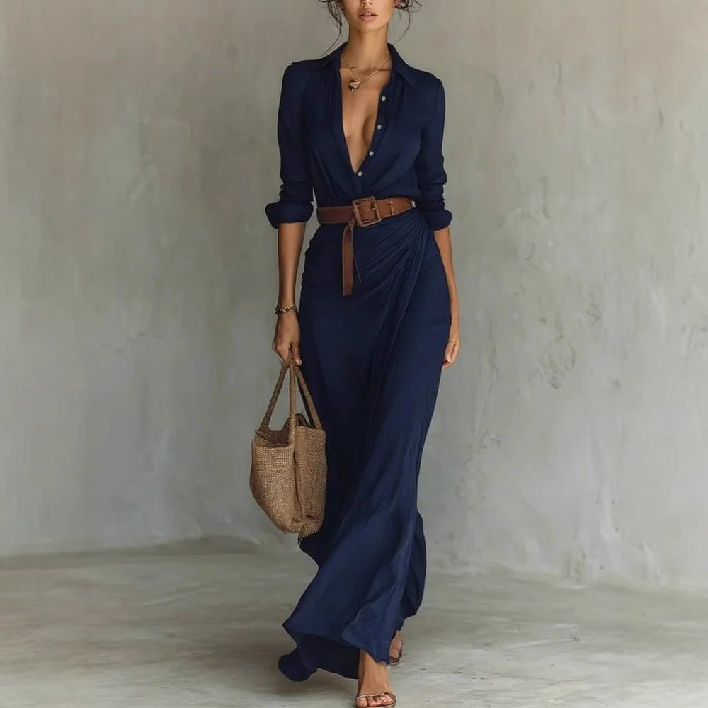 Elegant women's shirt dress in black featuring a waist belt and irregular hem, designed with long sleeves for a stylish and versatile look. 2