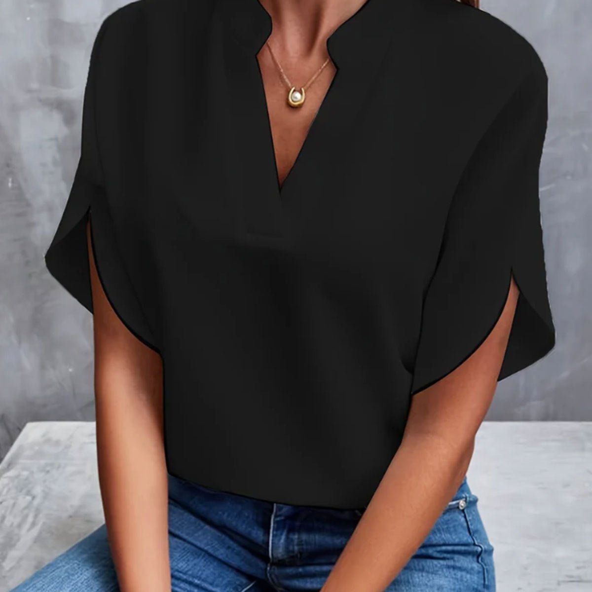 Women's short sleeve blouse made from lightweight polyester, perfect for summer wear, featuring a stylish design and versatile fit suitable for various occasions. 3
