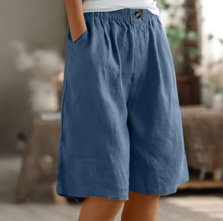 Womens shorts with elastic waistband in breathable fabric, mid-thigh length design for all-day comfort and versatility. 3
