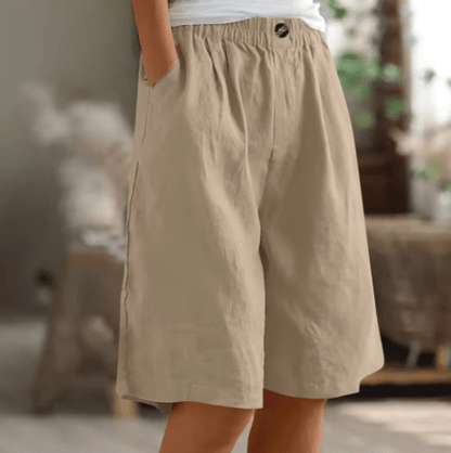 Womens shorts with elastic waistband in breathable fabric, mid-thigh length design for all-day comfort and versatility. 7
