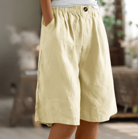 Womens shorts with elastic waistband in breathable fabric, mid-thigh length design for all-day comfort and versatility. 2