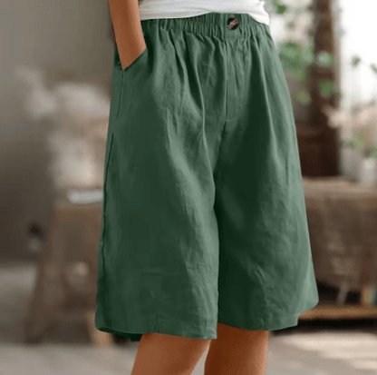 Womens shorts with elastic waistband in breathable fabric, mid-thigh length design for all-day comfort and versatility. 8