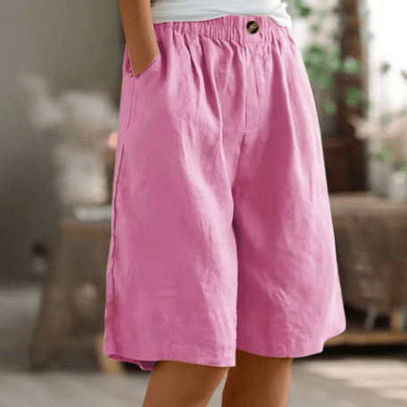 Womens shorts with elastic waistband in breathable fabric, mid-thigh length design for all-day comfort and versatility. 4